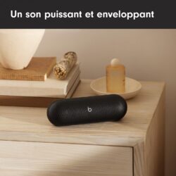 714VswAqQ1L._AC_SL1500_ Comparaison de taille de la Beats Pill à côté d'un smartphone.