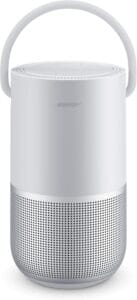 Enceinte Bose Portable Home Speaker argentée avec poignée de transport.