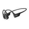 Casque à conduction osseuse Shokz OpenRun Pro noir porté par un coureur.